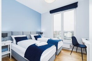 Two comfortable single beds in the bedroom. 