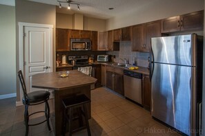 Fully stocked kitchen for all normal cooking.