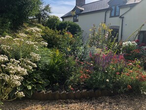 Cottage Garden, leading onto a small orchard and a summer house