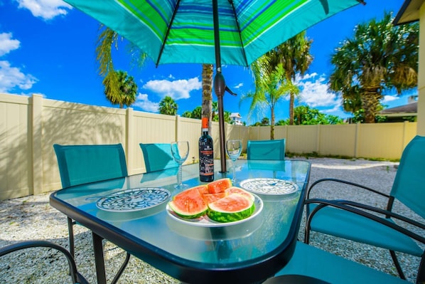 Outdoor dining for 6 under the shade.  Enjoy some wine and watermelon anytime!