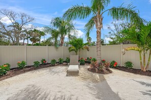 Palm trees and blue skies... enjoy your own oasis in the backyard