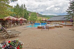Pool and Hot Tub area in summertime