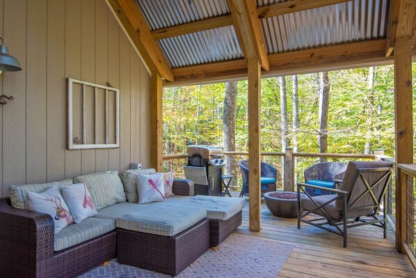 Perfection, covered deck and plenty of seating options with gas fire pit...