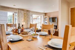 Large dining area with solid oak furniture