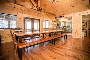 Gorgeous custom built table with open layout for living and kitchen area.