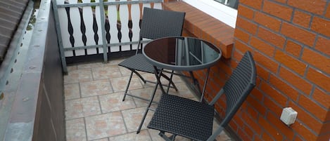 Furniture, Window, Chair, Wood, Road Surface, Outdoor Furniture, Outdoor Table, Brickwork, Plant, Building