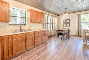 The kitchen is simple, but stocked with all the basic cookware and utensils