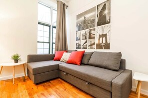 Bright Living room space with Huge sectional sofa!  