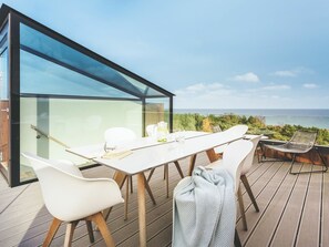 Furniture, Table, Sky, Cloud, Building, Chair, Wood, Outdoor Furniture, Shade, Interior Design