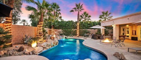 Backyard space: pool/spa, in and out pool chaise, kitchen island, natural gas fire pit, large seating area, billiards