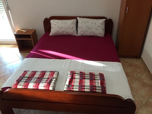 Comfortable King size bed in our bedroom which provides to you a quality dream!