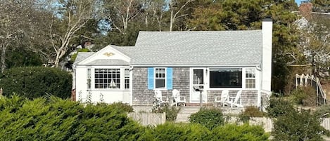 The 1 bedroom Sea Breeze Suite to the right with the raised patio perfect for sundowners. The 2 bedroom Dune Suite is the bay window to the left & flows back into the yard. This listing includes both suites; each has its own kitchen, full bath, LR.