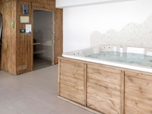 Furniture, Property, Cabinetry, Bathtub, Wood, Interior Design, Floor, Flooring, Plant