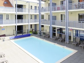 Building, Property, Window, Furniture, Swimming Pool, Water, Chair, Azure, Condominium, House