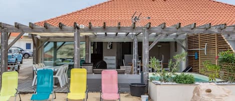 Sky, Property, Plant, Building, Window, Shade, Door, Cloud, Chair, House