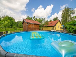 Cloud, Sky, Water, Building, Swimming Pool, Azure, Tree, House, Body Of Water, Shade