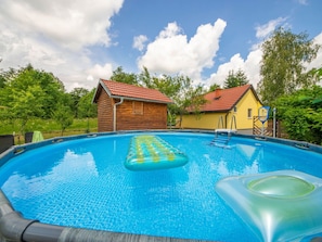 Cloud, Sky, Water, Building, Swimming Pool, Azure, Tree, House, Body Of Water, Shade