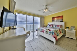 Gulf front master bedroom with a king size bed.