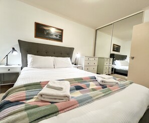 Luxury upholstered bed with comfortable Koala brand latex mattress. Made for Australian conditions. Bed & bath linen hire included. Designs will vary.