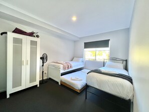 Bedroom 2 with trundle bed. Shopping trolley provided for your convenience.