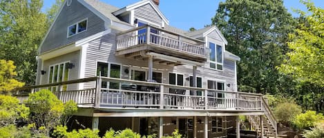 Home has a large main deck and lovely grounds