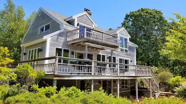 Home has a large main deck and lovely grounds