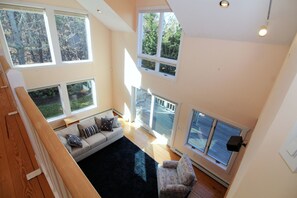 View of living room from second floor loft