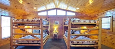 Amazing queen bunk room with plenty of floor space and TV