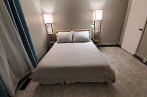 Master bed equipped w/ beddings & mattress protector for a comfortable sleep.