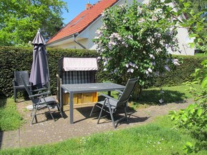 Plant, Table, Furniture, Building, Chair, Shade, Outdoor Table, Outdoor Furniture, Land Lot, Tree