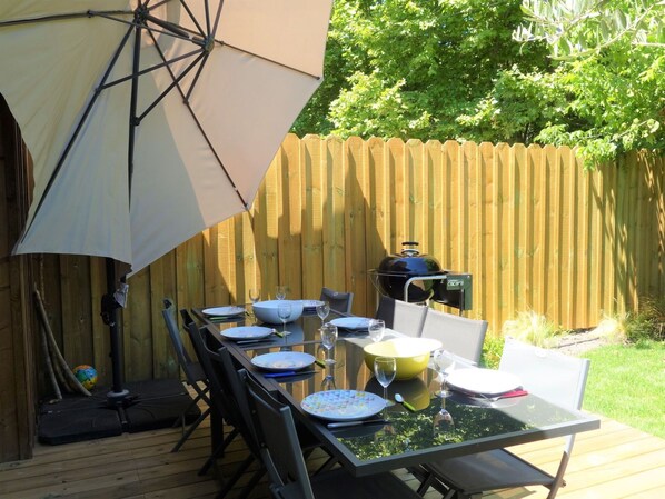 Table, Plant, Furniture, Property, Chair, Building, Shade, Outdoor Table, Umbrella, Outdoor Furniture