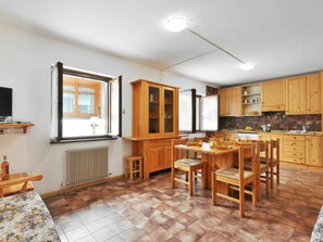 Furniture, Table, Picture Frame, Wood, Wood Stain, Flooring, Hardwood, Real Estate, Living Room, Chair