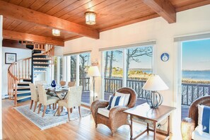 Dining area with stairs to upstairs master bedroom