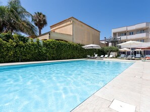Water, Plant, Property, Sky, Building, Swimming Pool, Azure, Shade, Tree, Outdoor Furniture