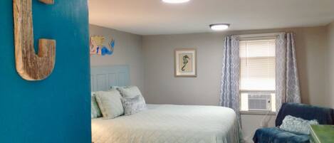 Welcome to The Seahorse Suite Master Bedroom