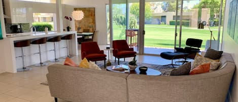 Light and cheerful formal living room.   Perfect for hosting a cocktail party.