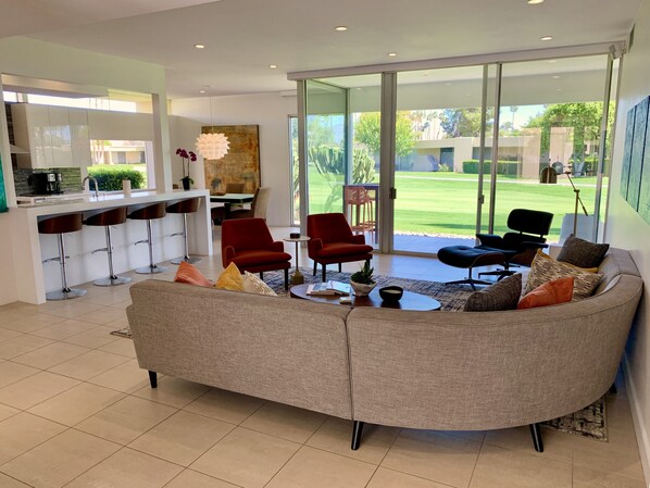 Light and cheerful formal living room.   Perfect for hosting a cocktail party.