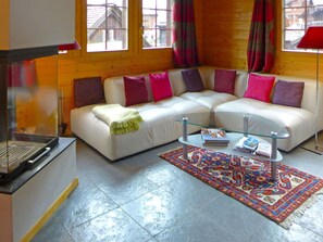 Living Room, Furniture, Room, Couch, Property, Interior Design, Floor, Orange, Coffee Table, Table