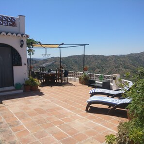 Private rear terrace .