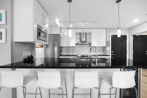 Kitchen with Bar Granite Countertop