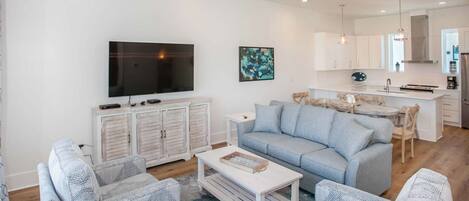 Cute comfy living room with a flat screen TV