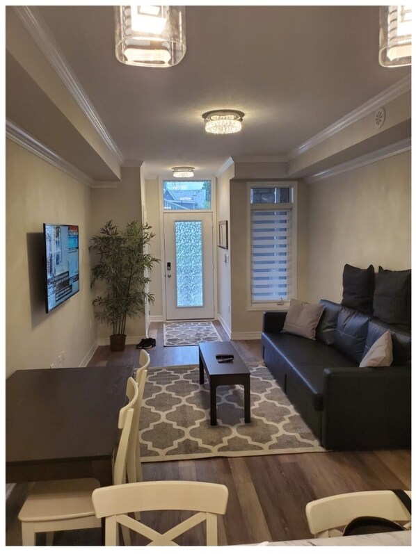Full view of living room and dining room.