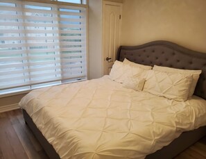 Master Bedroom with blinds open.