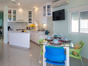 Table for  four - Convenient dining area.