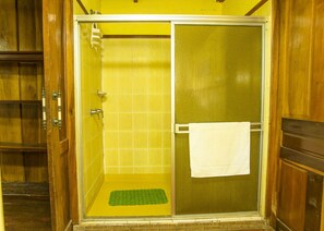 Walk in shower with hot water.