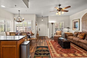 A view of the entry way and living area