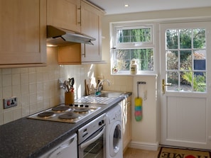 Galley kitchen ground floor | Chesterton Cottage, East Kirkby, near Spilsby