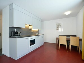 Cabinetry, Countertop, Furniture, Building, Kitchen Stove, Kitchen Appliance, Kitchen, Wood, Interior Design, Drawer
