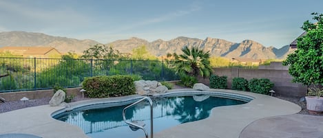 Panoramic Catalina Mountain views inside and out.  Sparkling pool w/waterfall.