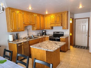 Updated kitchen with new counter tops and applicances.  Everything you'll need.
